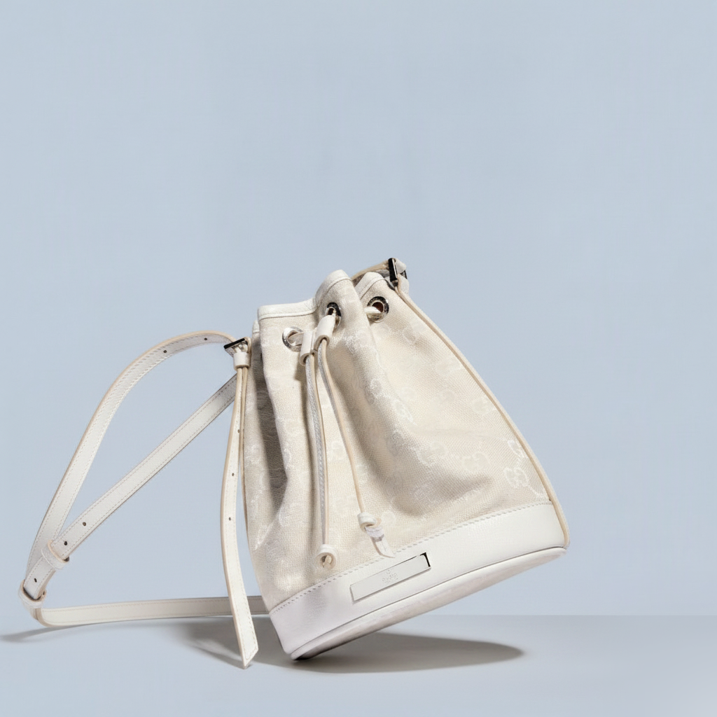 Mini bucket bag with Gucci plaque